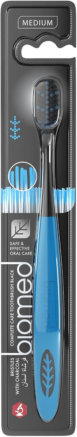 BIOMED toothbrush package showing eco-friendly claim and bristle detail.