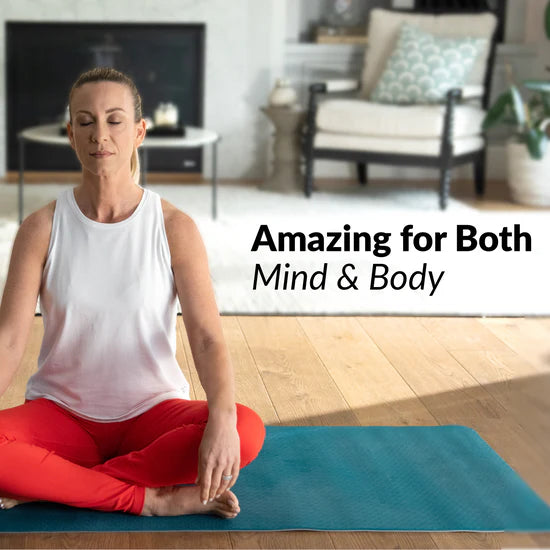 Woman practicing yoga in a living room with text 'Amazing for Both Mind & Body'.