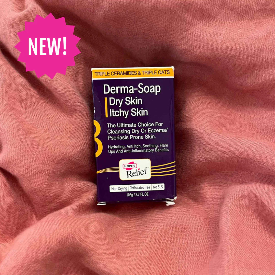 Box of Derma-Soap on a pink fabric background with a 'NEW!' label.