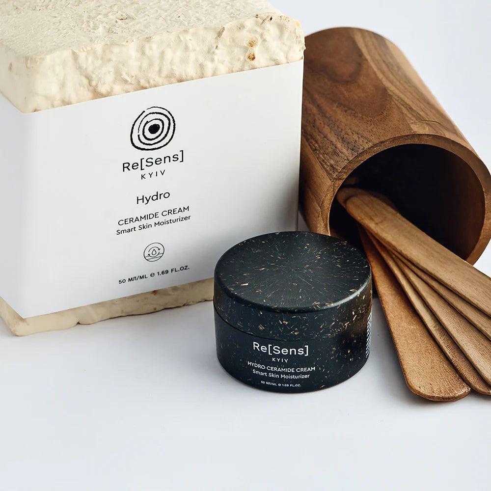 Cosmetic products with 'Re[Sens] Kyiv' branding on a white background