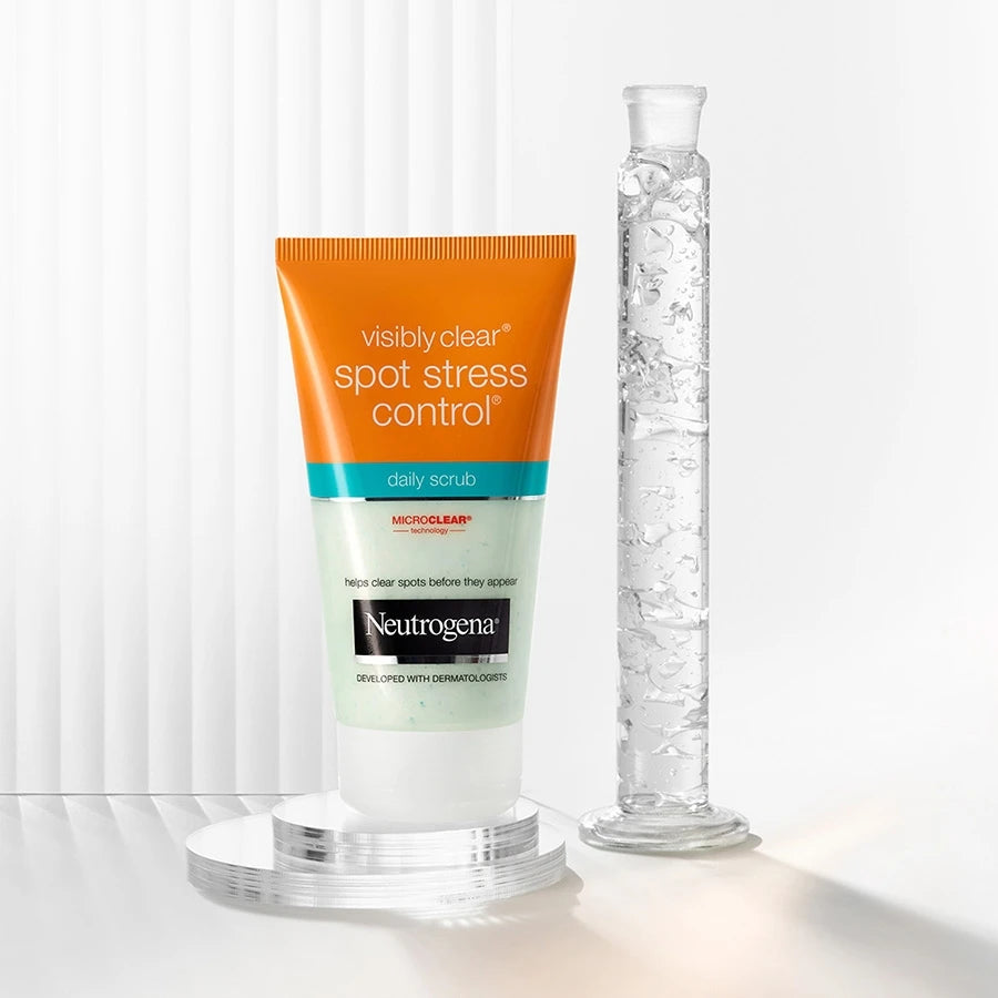Neutrogena Visibly Clear Daily Scrub 150ml tube, blue and white packaging, isolated on white.