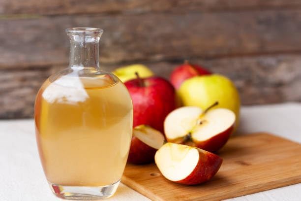 Lifestyle/use image: Acetum apple cider vinegar used in cooking and drinks bottle 1L