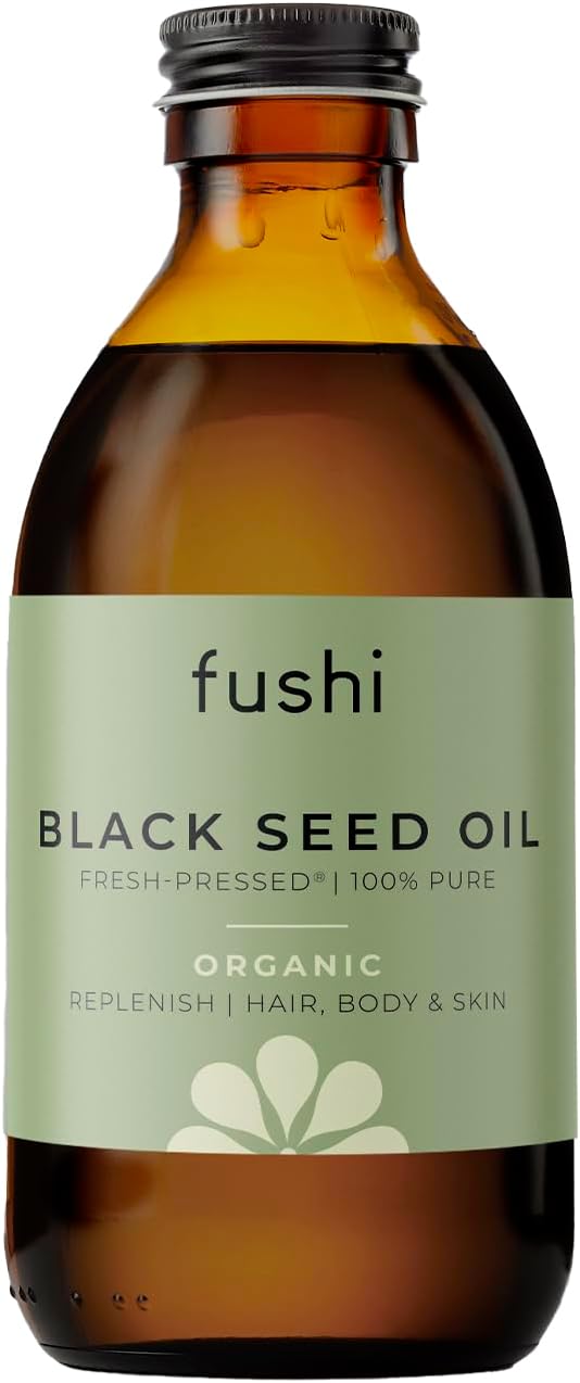 Bottle of fushi Black Seed Oil with a label on a white background