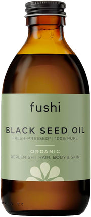 Bottle of fushi Black Seed Oil with a label on a white background
