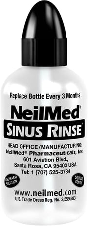 NeilMed Sinus Rinse Pediatric Starter  bottle and saline sachets.