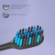 BIOMED Black Charcoal Toothbrush, medium bristles, on a clean background.