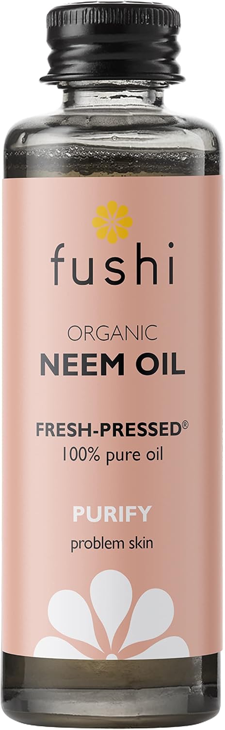 Fushi Organic Neem Oil bottle with pink label on a white background