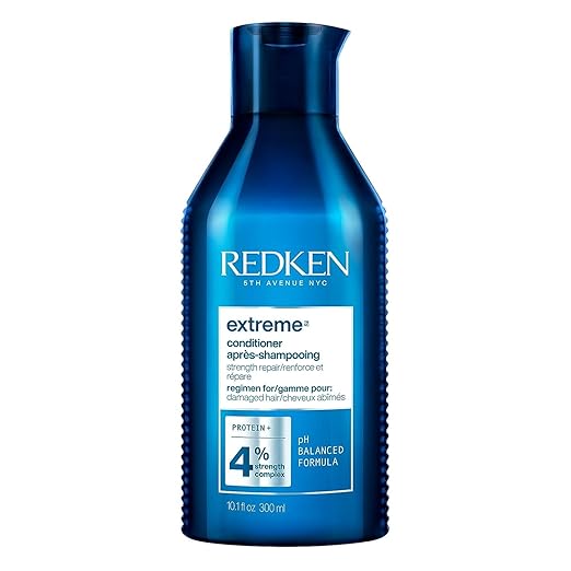 Redken Extreme Conditioner bottle, protein formula, 300ml on white background.