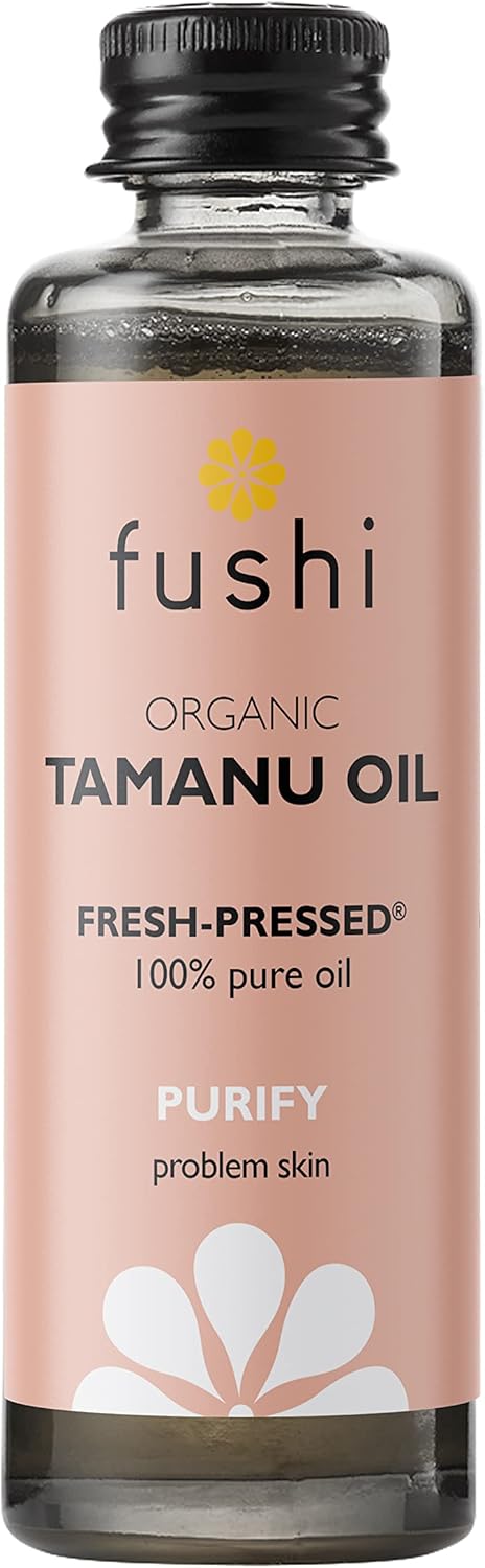 Fushi Organic Tamanu Oil bottle with pink label on a white background