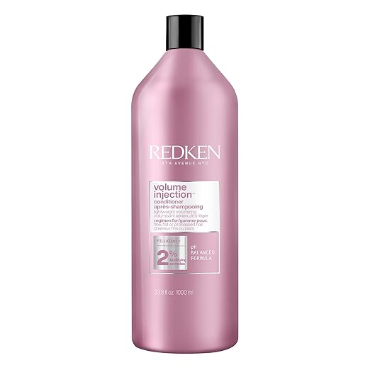 Redken Volume Injection Conditioner for fine hair, 1000ml bottle, on white background.