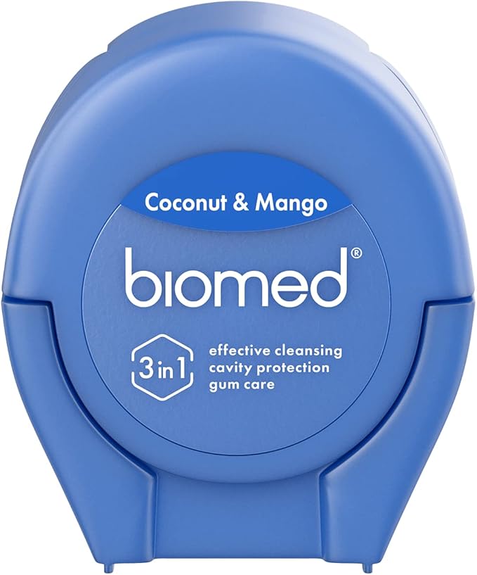 BIOMED Coconut and Mango flavored dental floss dispenser on a clean background.