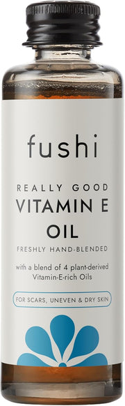 Fushi Vitamin E oil bottle on a white background