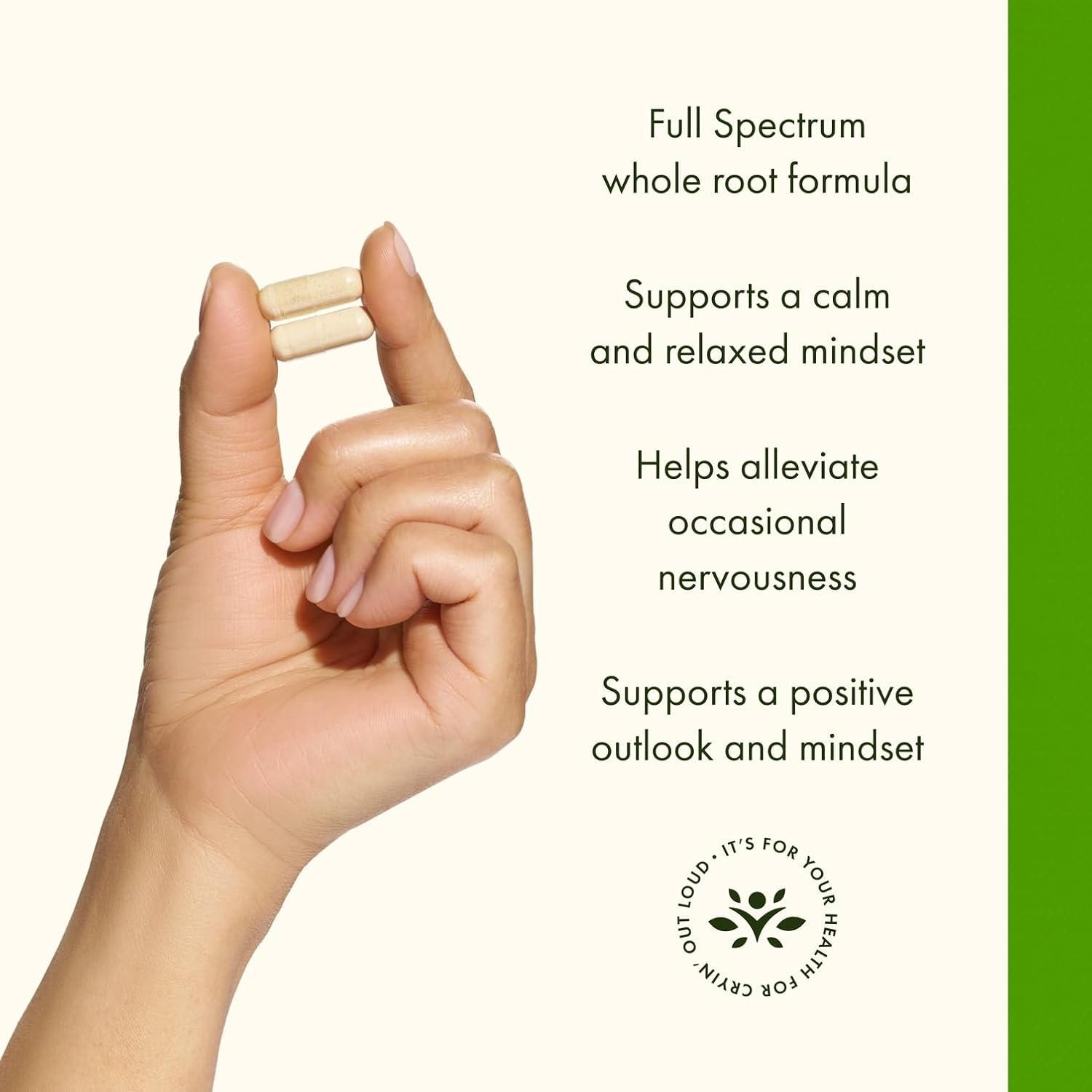 Hand holding a small wooden stick with text about a full spectrum whole root formula on a white background.