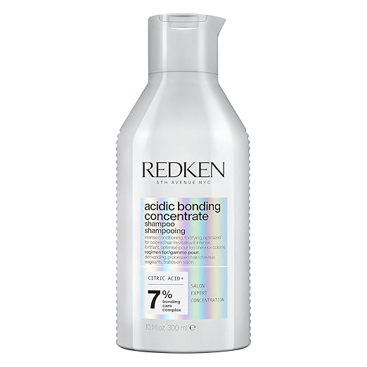 Redken Acidic Bonding Concentrate Shampoo bottle, 300ml, on white background.