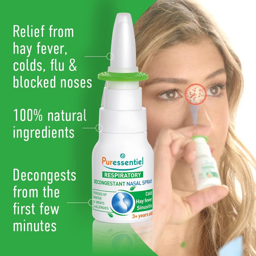 Hand holding Puressentiel nasal spray bottle in use.
