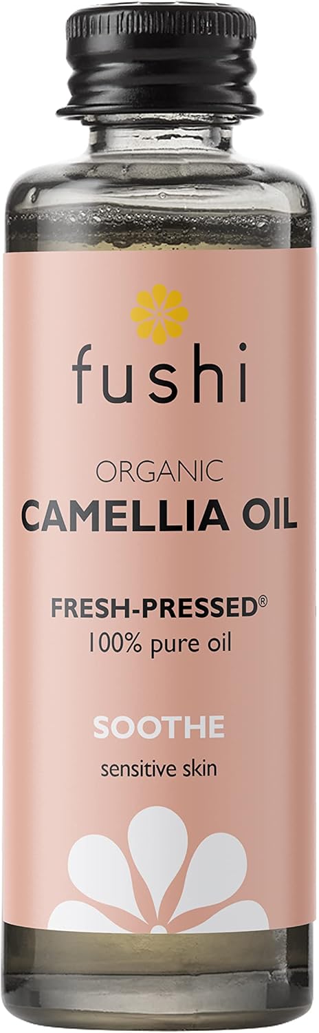 Fushi Organic Camellia Oil bottle with pink label on a white background