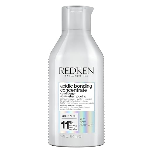 Redken Acidic Bonding Concentrate Conditioner bottle, 300ml, on white background.