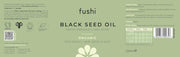 Fushi Black Seed Oil label with green background and text