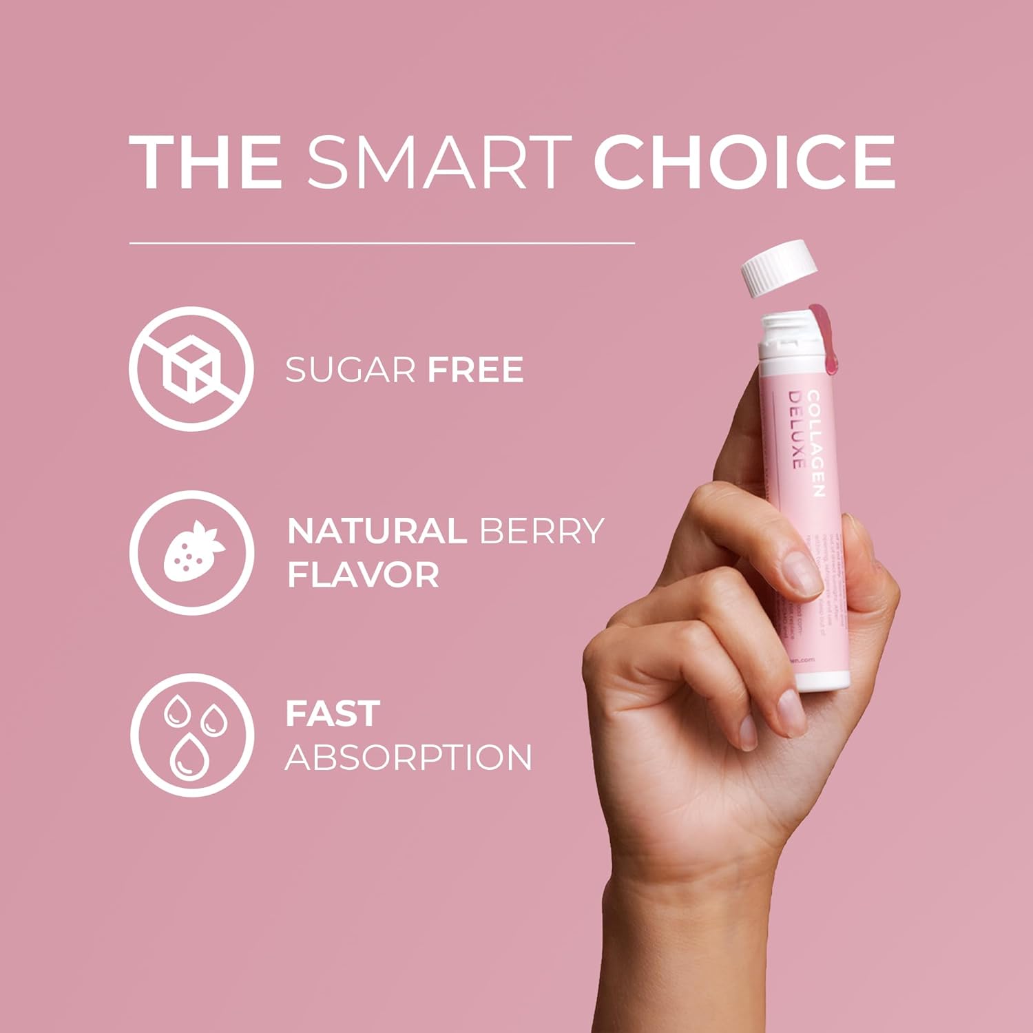 Hand holding a pink supplement tube with features listed on a pink background