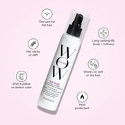 Hair product bottle with features listed on a pink background