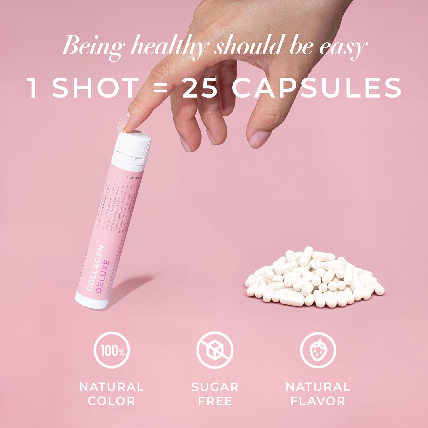 Hand holding a pink supplement shot with text about health benefits on a pink background