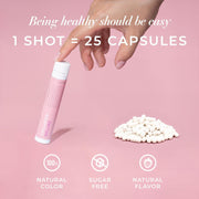 Hand holding a pink supplement shot with text about health benefits on a pink background