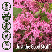 Pink flowers with 'Just the Good Stuff' branding and certification icons on a purple background
