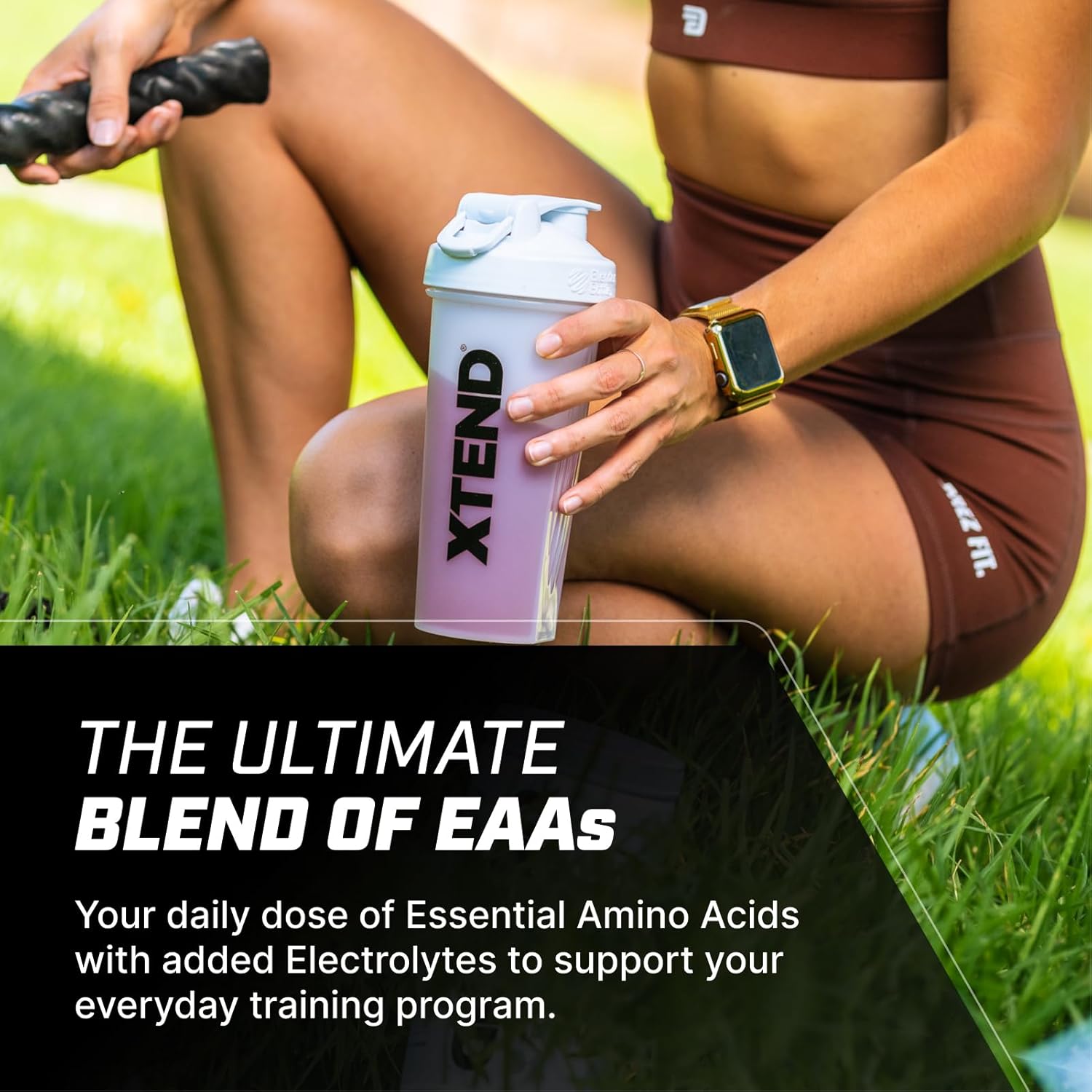 Lifestyle/use image: XTEND EAA Amino Acids Powder Summer Fruits drink prepared in shaker tub powder 296g 40 servings