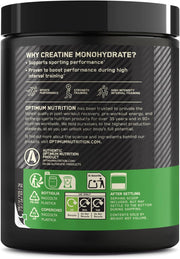 Back label of a supplement container with text and branding on a black and green background