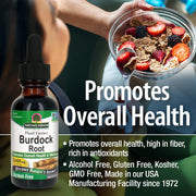 Bottle of Nature's Answer Burdock Root supplement with a bowl of cereal and berries in the background.