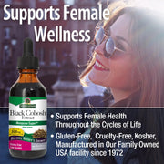 Nature's Answer Black Cohosh Extract bottle with a blurred background of a woman outdoors.