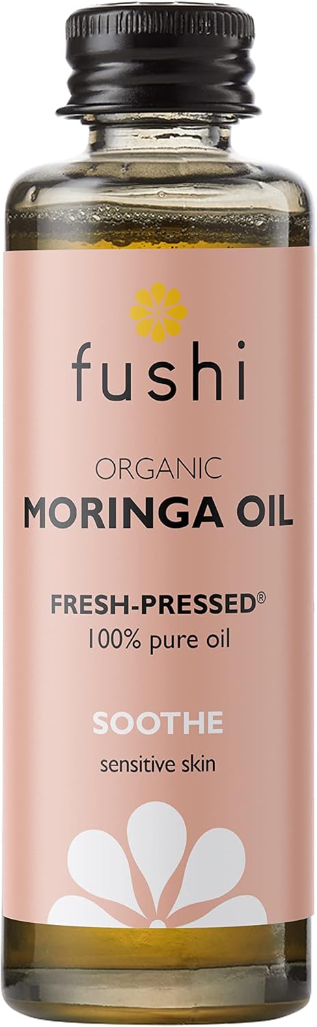 Fushi Organic Moringa Oil bottle with pink label on a white background