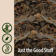 Close-up of dried seaweed with 'Just the Good Stuff' branding and certification logos on a beige background.