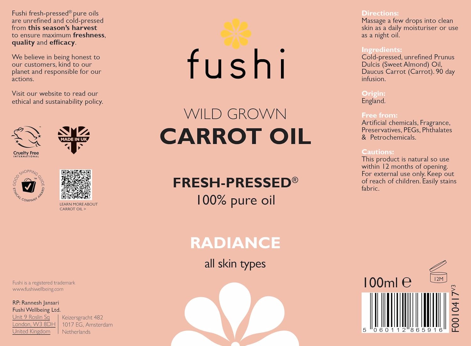 Fushi Wild Grown Carrot Oil label on a pink background