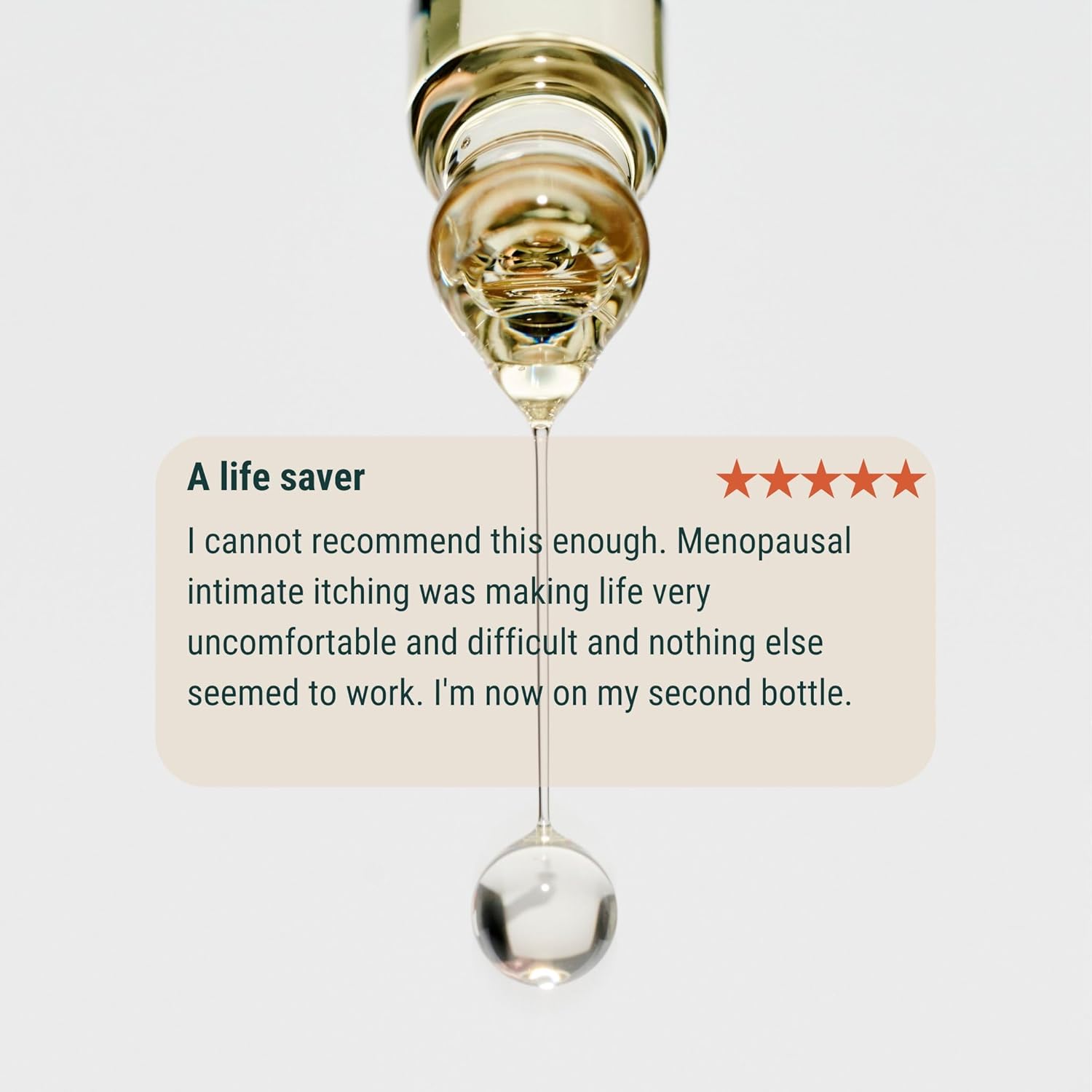 Syringe with liquid and five-star rating text on a light gray background