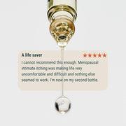 Syringe with liquid and five-star rating text on a light gray background