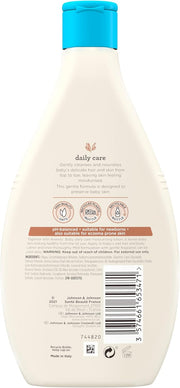 Back of Aveeno Baby Wash bottle showing ingredients, barcode and safety warnings.