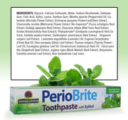 PerioBrite toothpaste box with green leafy vegetables and a detailed list of ingredients on a light green background.