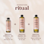 Three bottles of fushi organic oils with a beige background and text describing each oil's benefits.