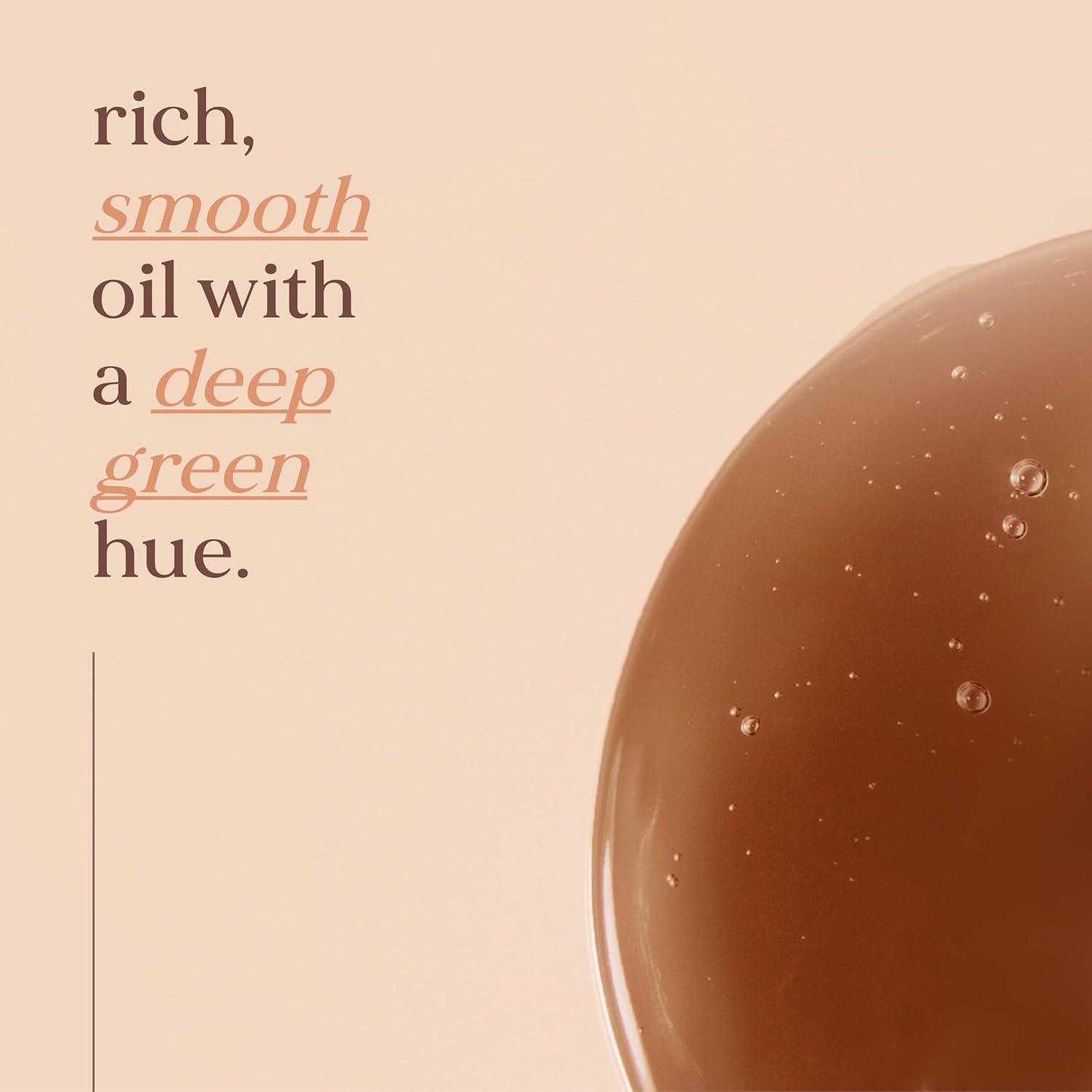 Close-up of rich, smooth oil with a deep green hue on a beige background