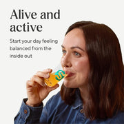 Symprove Liquid Probiotic Mango Passionfruit Flavour 4 x 500ml probiotic drink lifestyle woman drinking