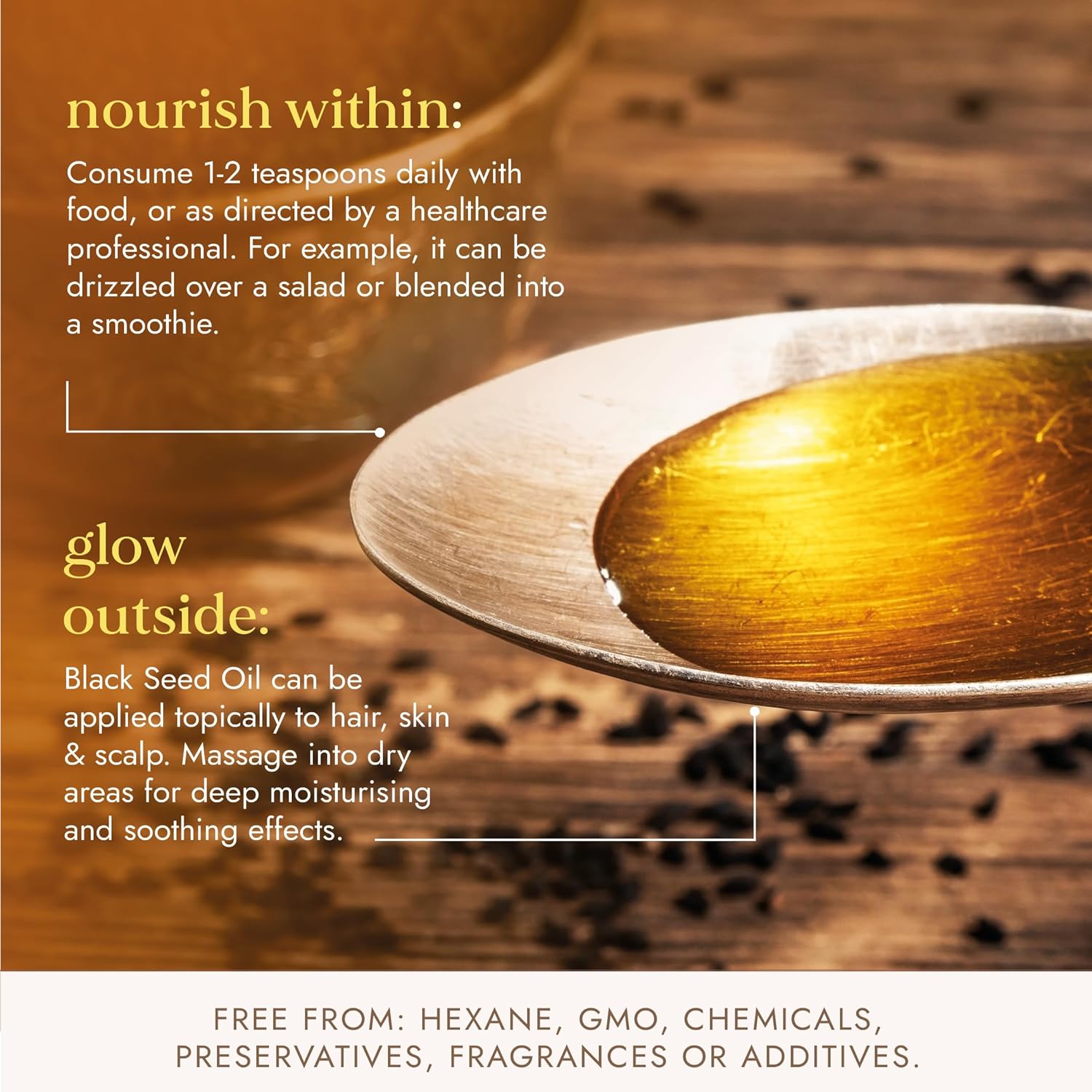 Spoon with black seed oil and text about usage on a wooden background