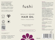 Fushi Really Good Hair Oil label with product details and branding elements.