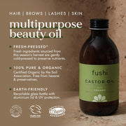 Fushi Castor Oil bottle with product details on a brown background
