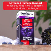 Sambucol Black Elderberry Liquid packaging with black elderberries on a wooden surface.