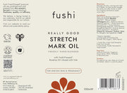 Fushi stretch mark oil label with branding and product details.