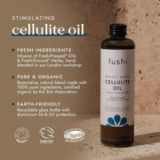 Fushi Cellulite Oil bottle with product details on a brown background