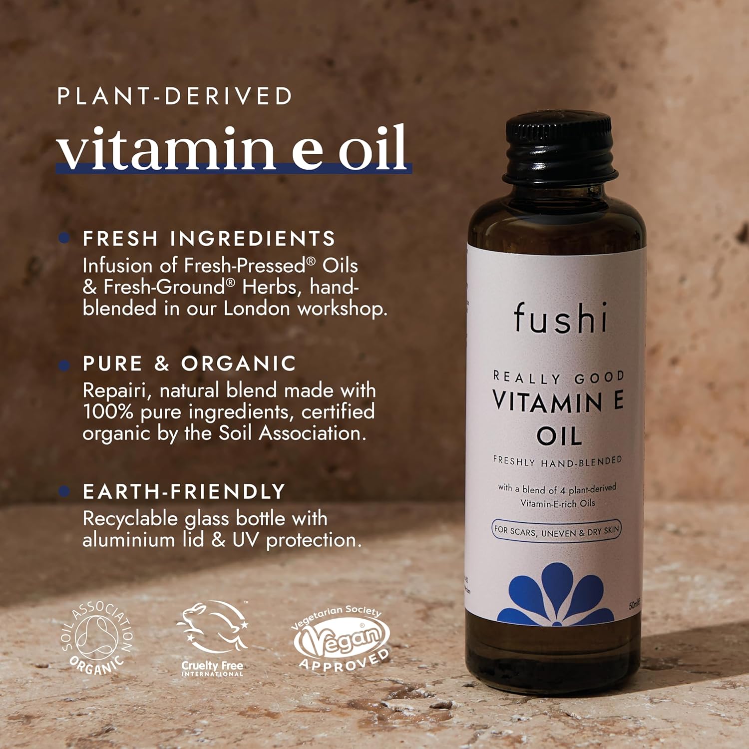 Fushi Vitamin E oil bottle with product details on a wooden background