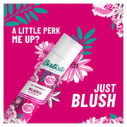 Batiste Dry Shampoo Blush Flirty Floral 200ml can, pink design background.