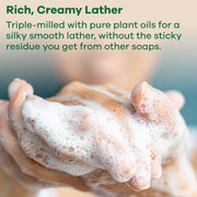 How to Use: Lathering the Valencia Orange soap bar in hand.